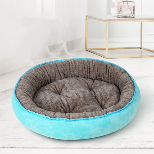 Blue oval plush pet bed, L, 56 by 50 cm, with grey-brown interior