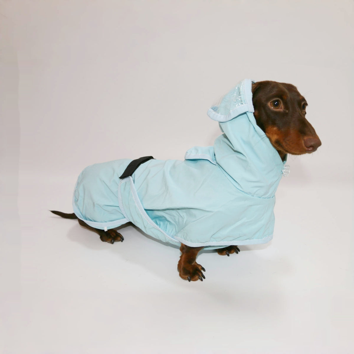 raincoat side profile with hood up